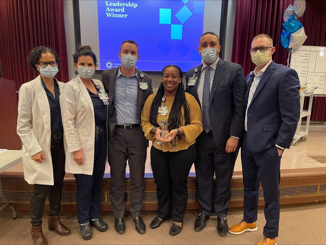 doctors celebrate Chanel Mitchell and her award